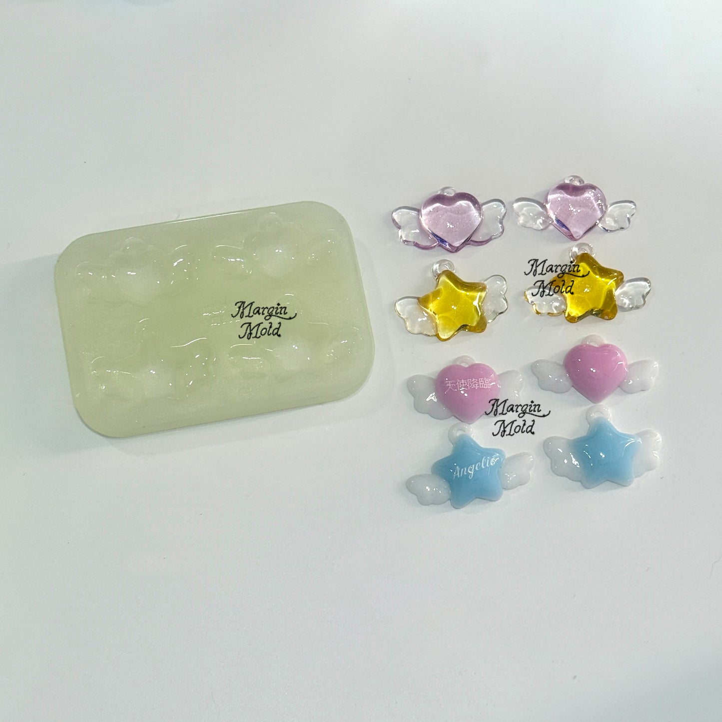 k110 winged hearts and stars keyring mold L, 3d printed, shiny