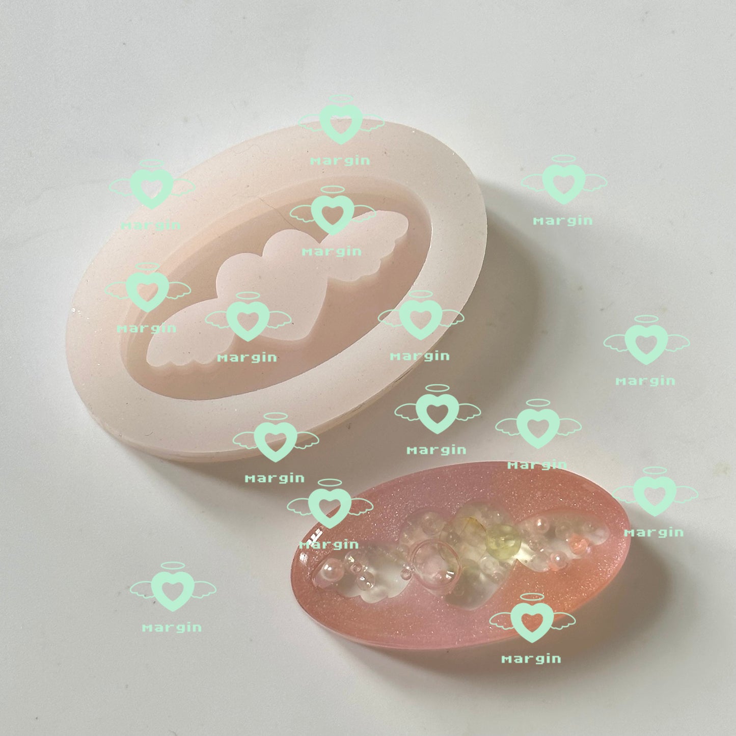 SK105 angel heart wing oval shaker mold, backed, acrylic, shiny