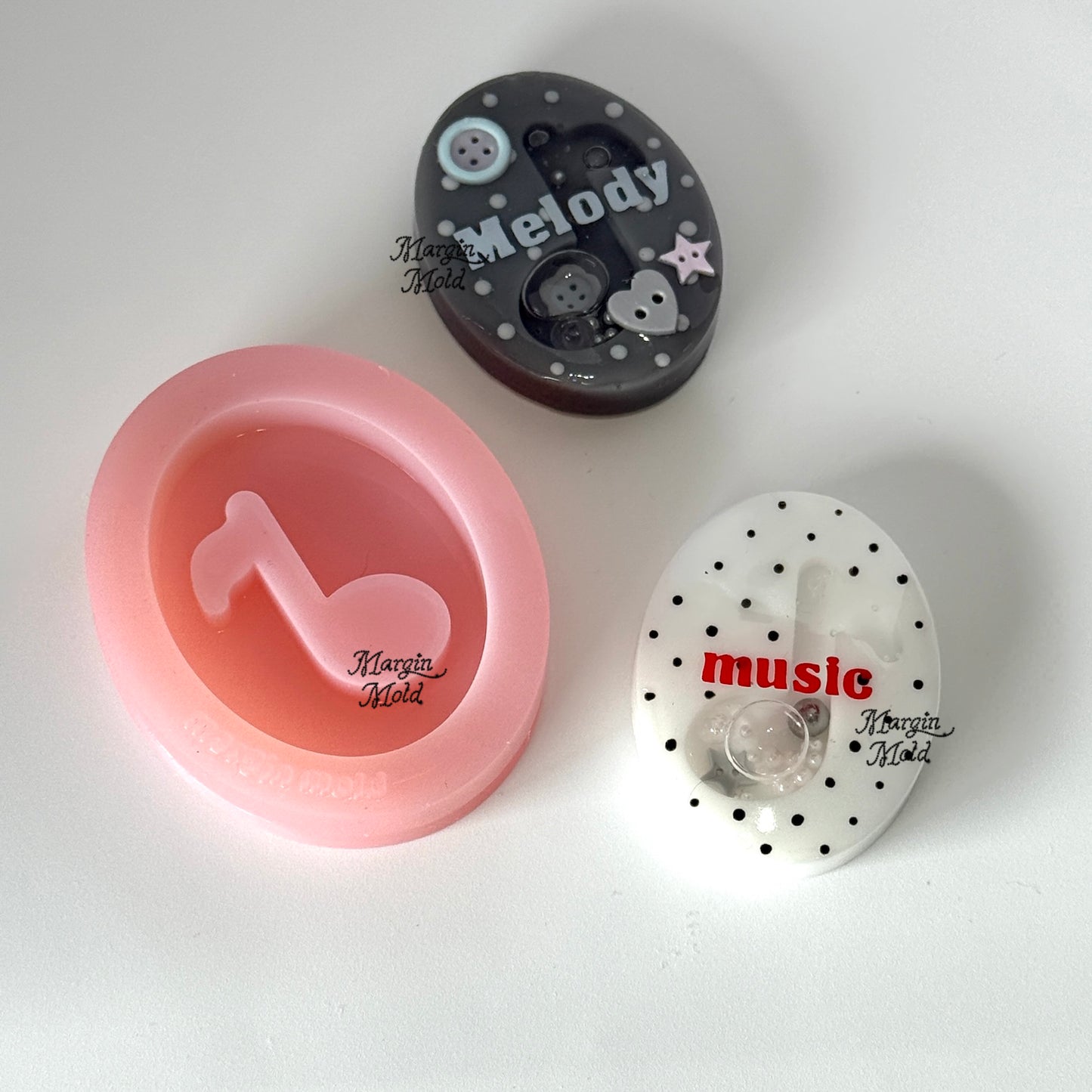 SK234 oval music note shaker mold, backed, acrylic, shiny
