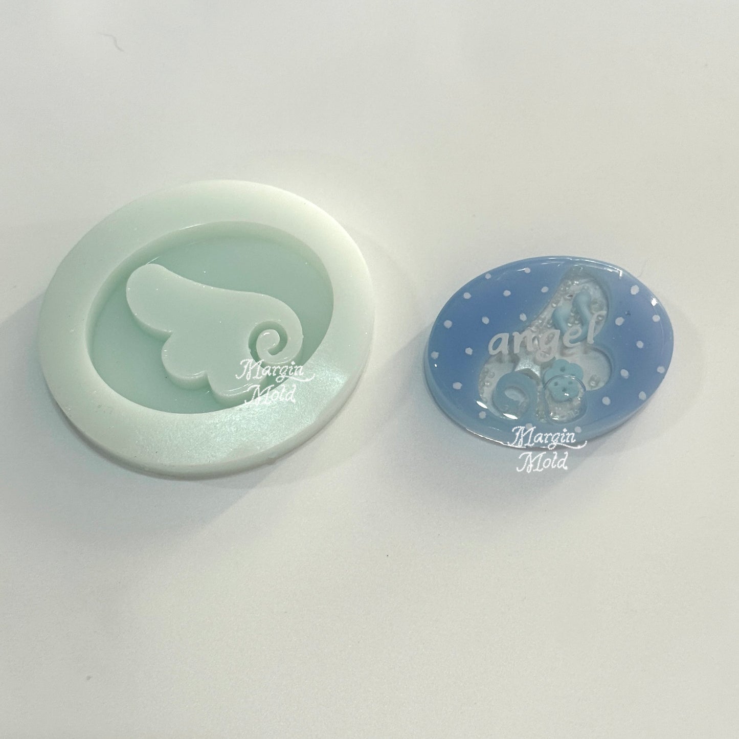 SK237 oval angel wing shaker mold, backed, acrylic, shiny