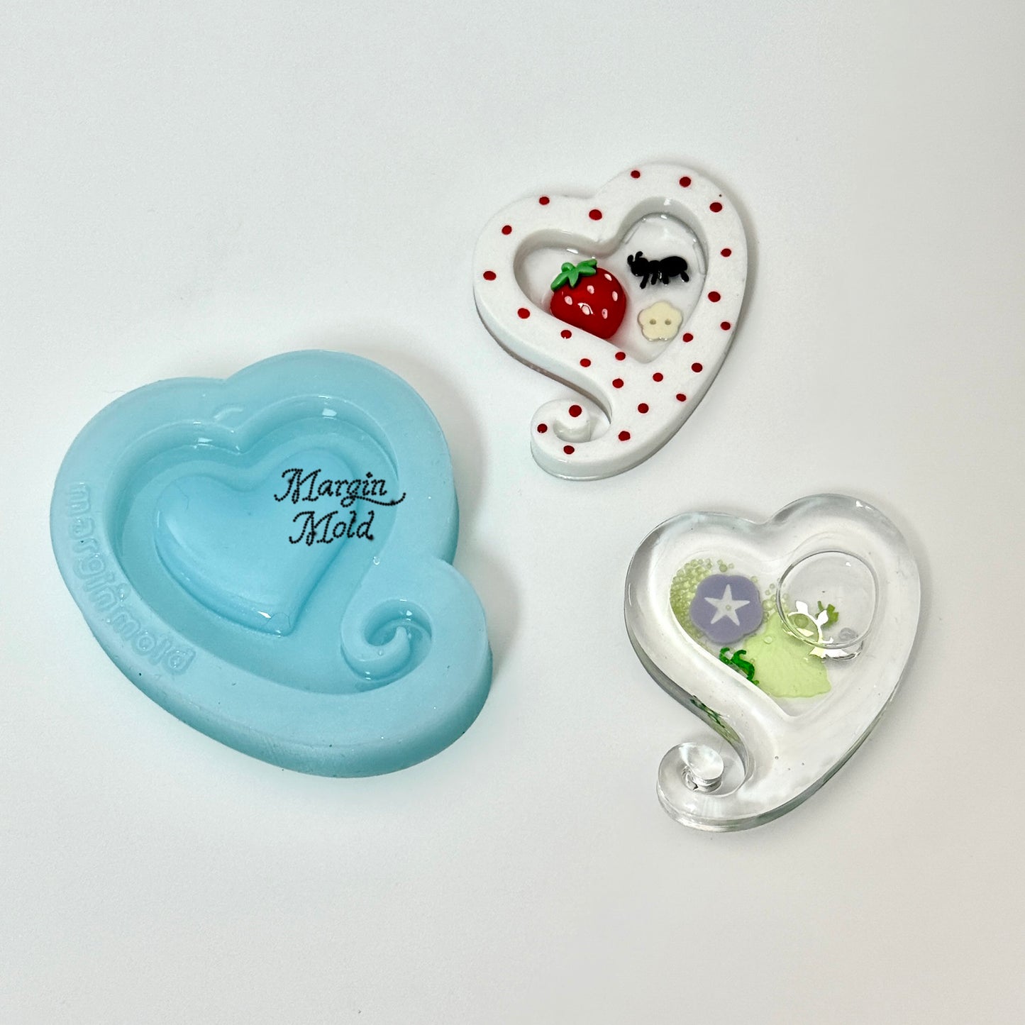 SK244  SK245 spiral heart shaker mold, backed, acrylic, shiny