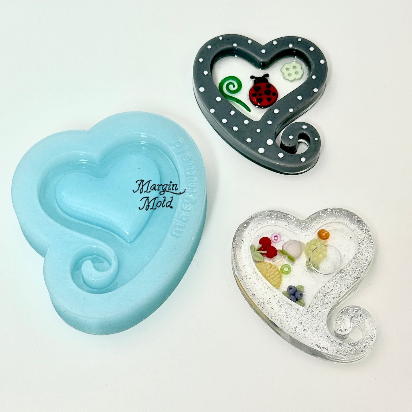 SK244  SK245 spiral heart shaker mold, backed, acrylic, shiny